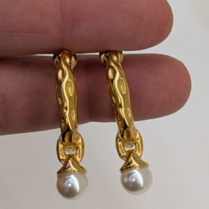 Gold-plated steel rings with a pearl